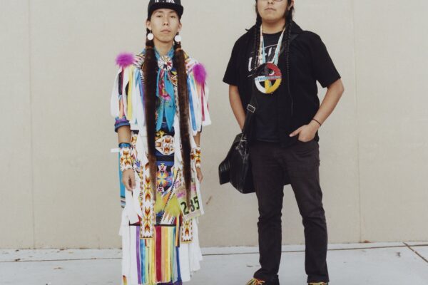 Fast Eddie (left), a pow wow dancer, is pictured with social media celebrity, Two Braids.